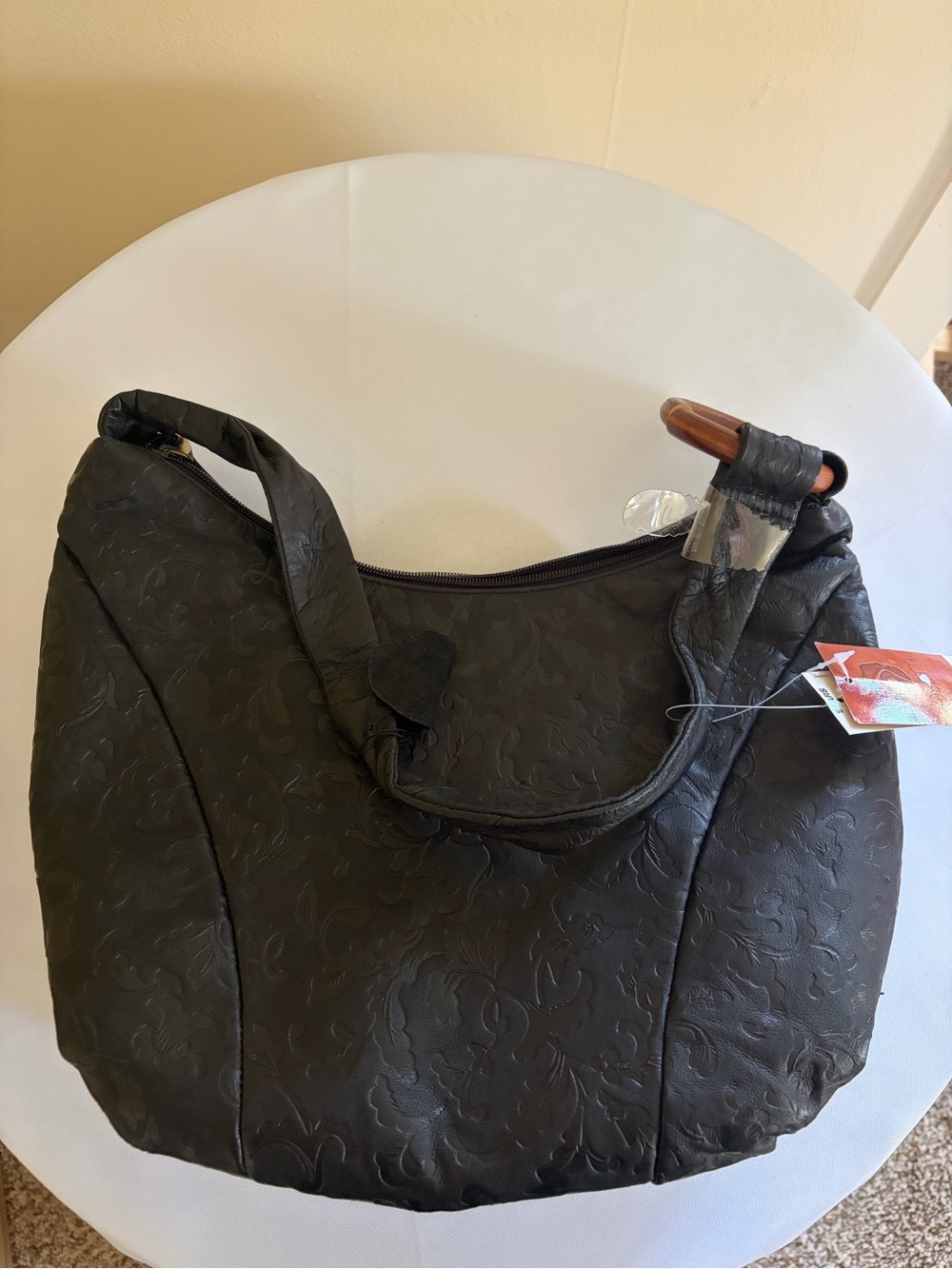 Rosetti Black Floral-Embossed Shoulder Bag with Wooden Accent